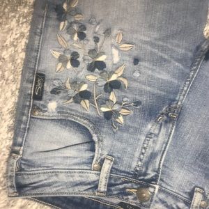 Floral Embroidered ripped jeans